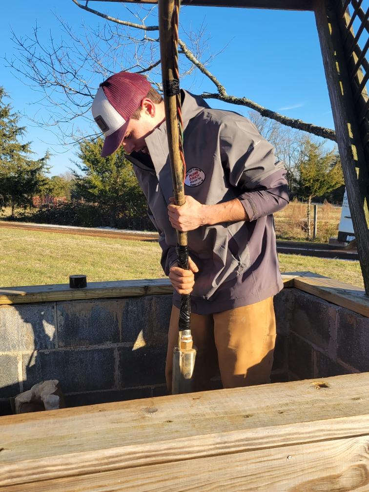 plumber installing a well pump in Burnt Chimney NC