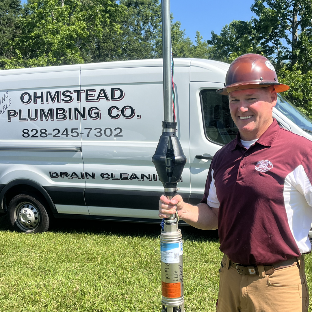 Local plumber in Shelby, North Carolina, Erik Ohmstead Pulling a well pump.